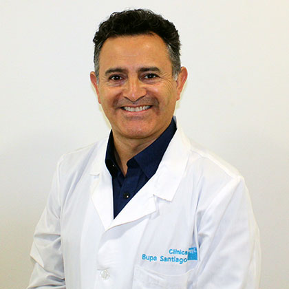Dr. Carlos Riquelme Báez